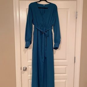 Long Teal Dress ordered from a boutique. Never worn. Has not been altered.